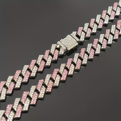 Bracelet with pink and silver chain links on a dark background